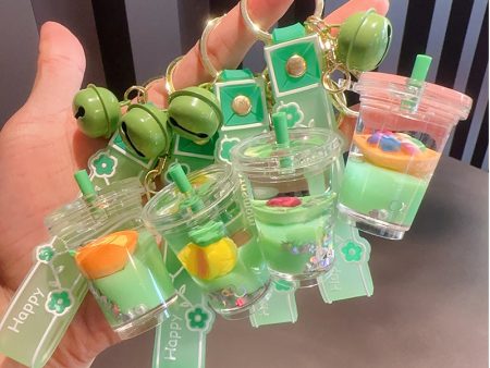 Wholesale Creative Green Fruit in Oil Floating Quicksand Drift Bottle Acrylic Keychain Supply