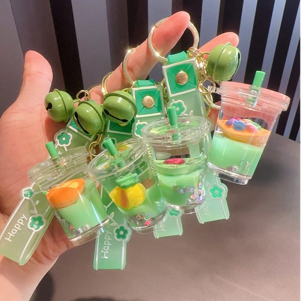 Wholesale Creative Green Fruit in Oil Floating Quicksand Drift Bottle Acrylic Keychain Supply