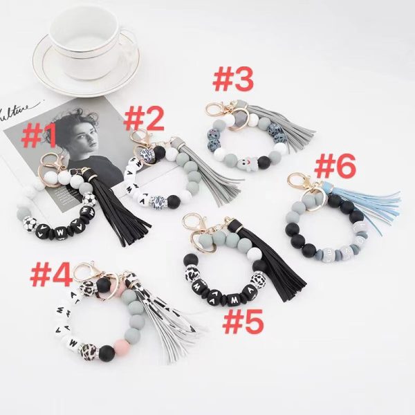 Wholesale 10PCS Silicone Bead Bracelets with Tassel Wood Beads Keychains Discount